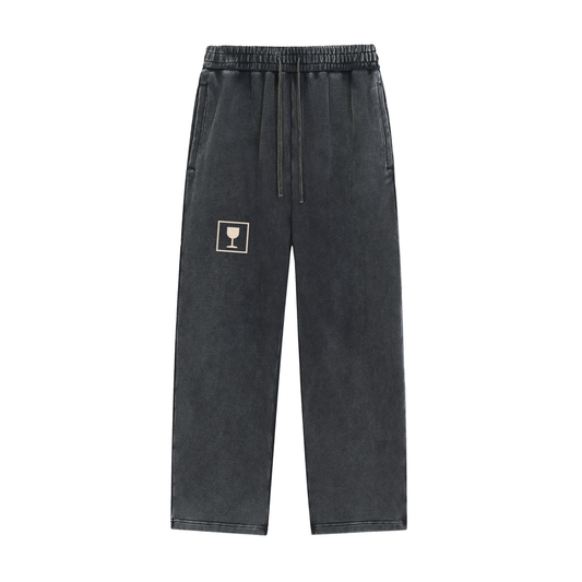 NOT FRAGILE. Snow Washed Sweatpants in Black, front
