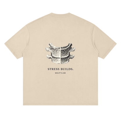 STRESS BUILDS. Tee in Sand, back print