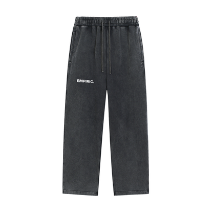 STRESS BUILDS. Snow Washed Sweatpants in Black, front
