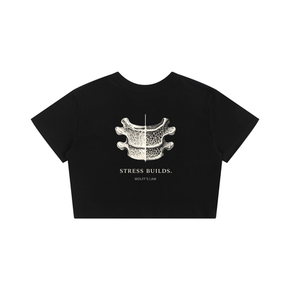 STRESS BUILDS. Women's Crop Tee — Black, back print detail