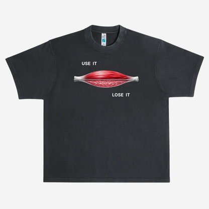 EMPIRIC. USE IT / LOSE IT tee — front print detail, muscle cross-section comparison graphic