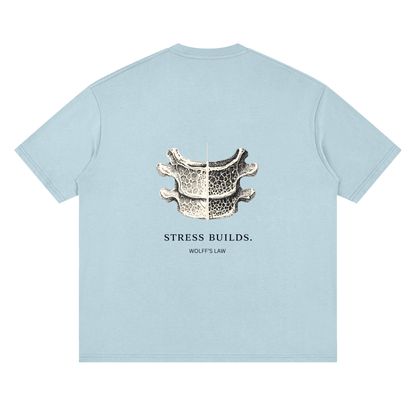 STRESS BUILDS. Tee in Sky, back print
