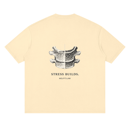 STRESS BUILDS. Tee in Apricot, back print